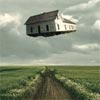 Сюрреалистичная картина с летающим домом в Photoshop