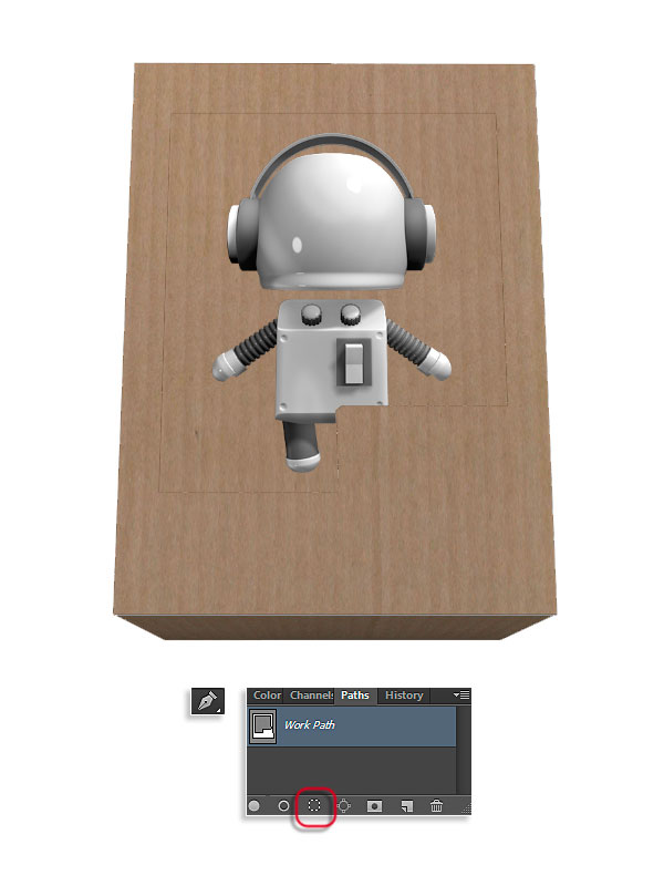 Картонная коробка с игрушечным роботом